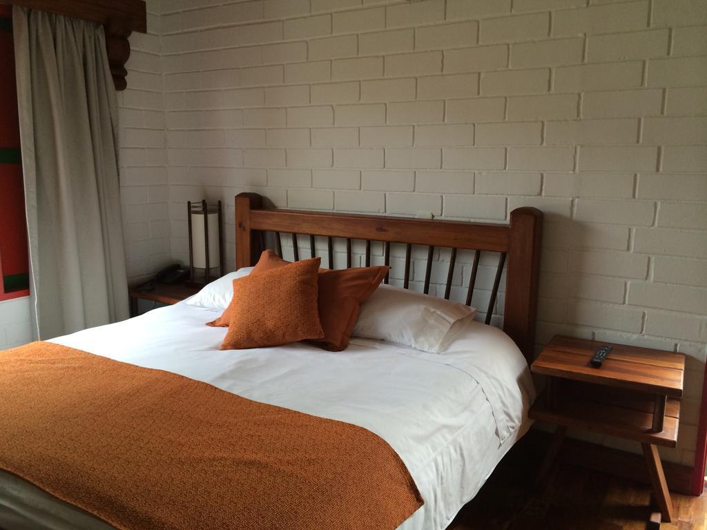 Termales El Otono Hotel La Enea ภายนอก รูปภาพ A bedroom at the hotel
